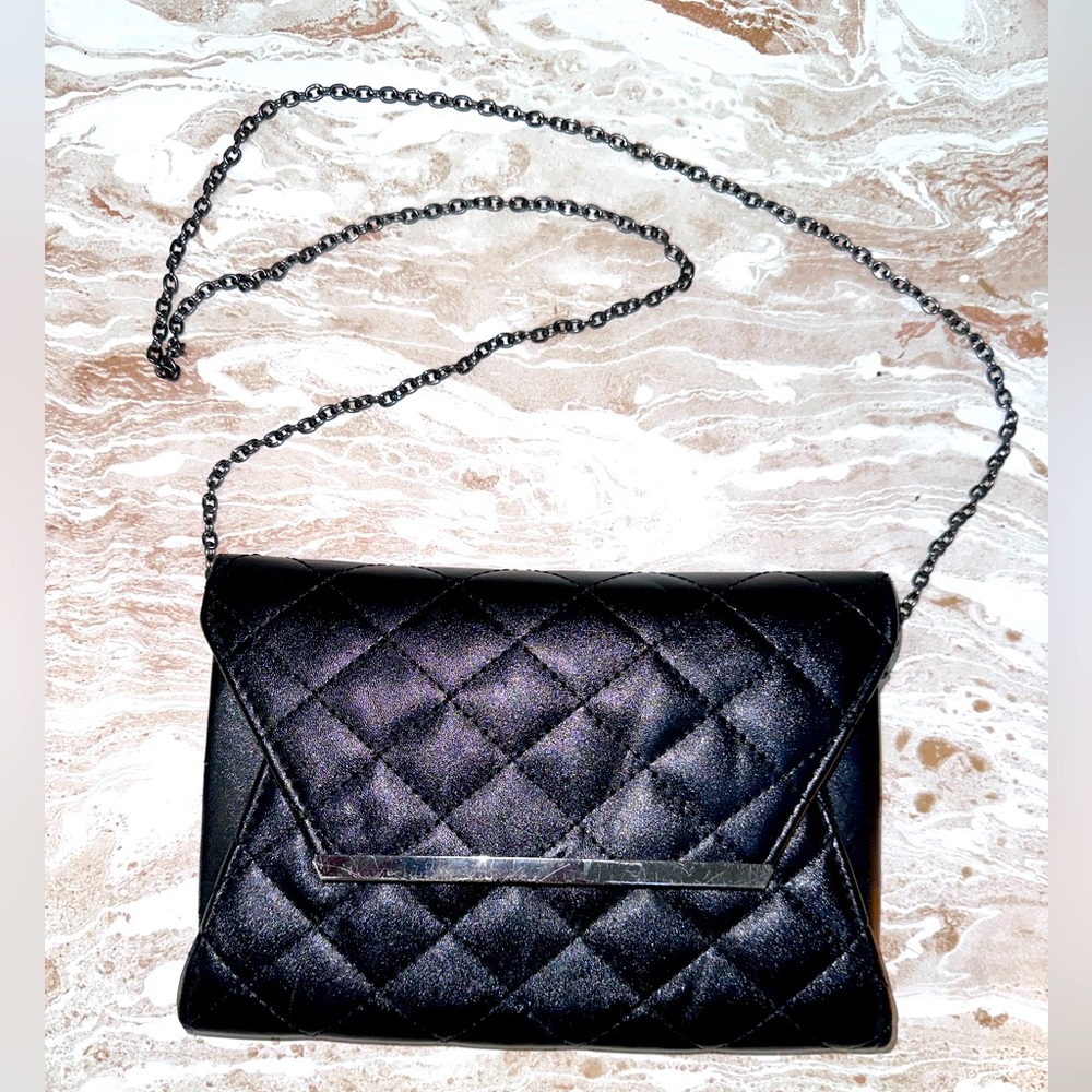Black quilted cross body clutch with chain super stylish
